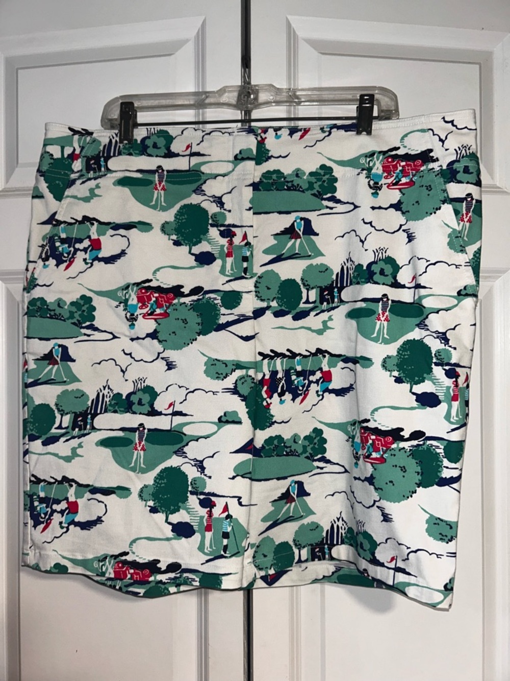 Izod White Golf-Scene Print Skort with Green and Navy Accents - Picture 1 of 6